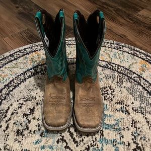 Emerald green square toe western boots.